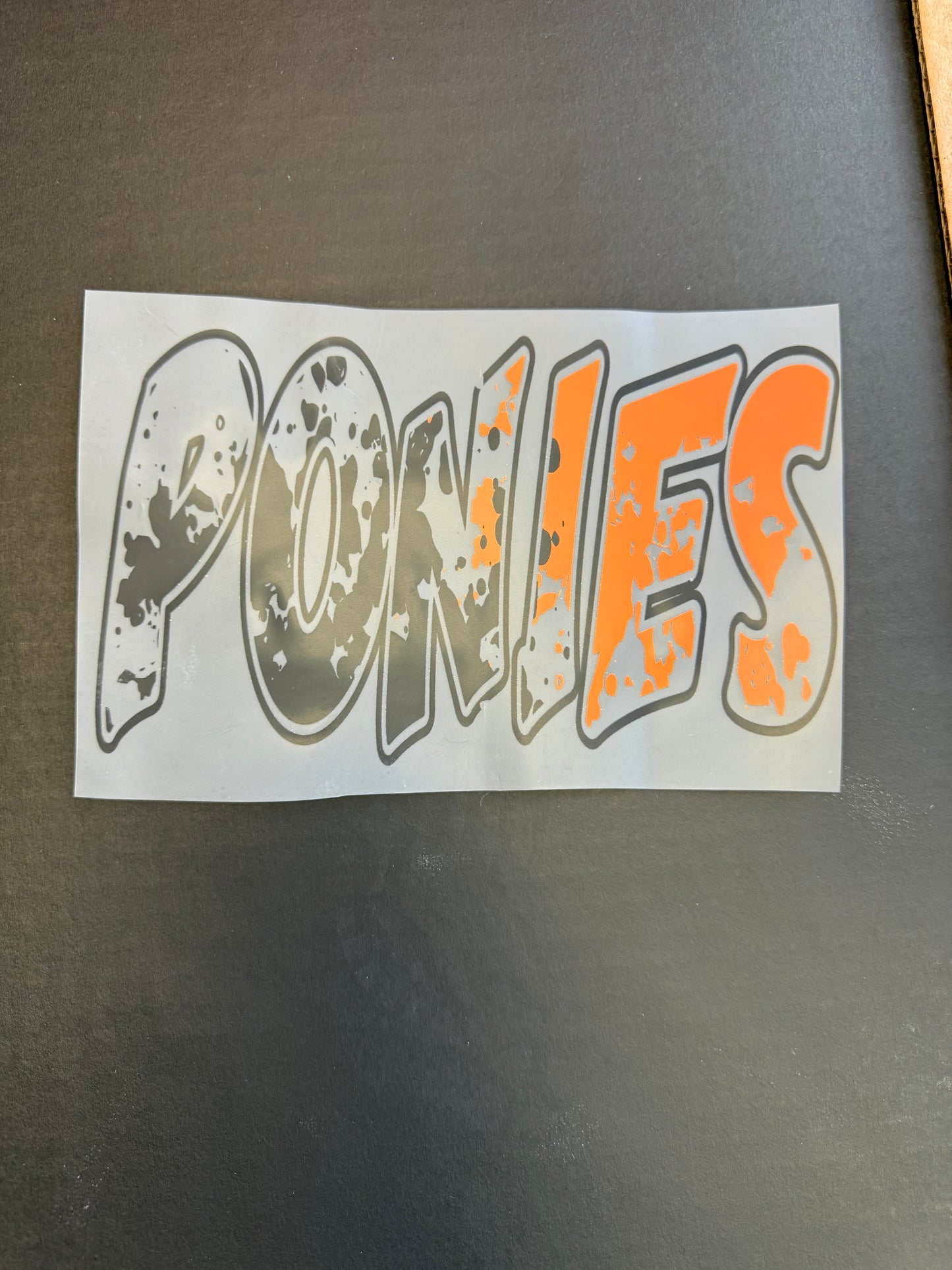 ponies half black half orange