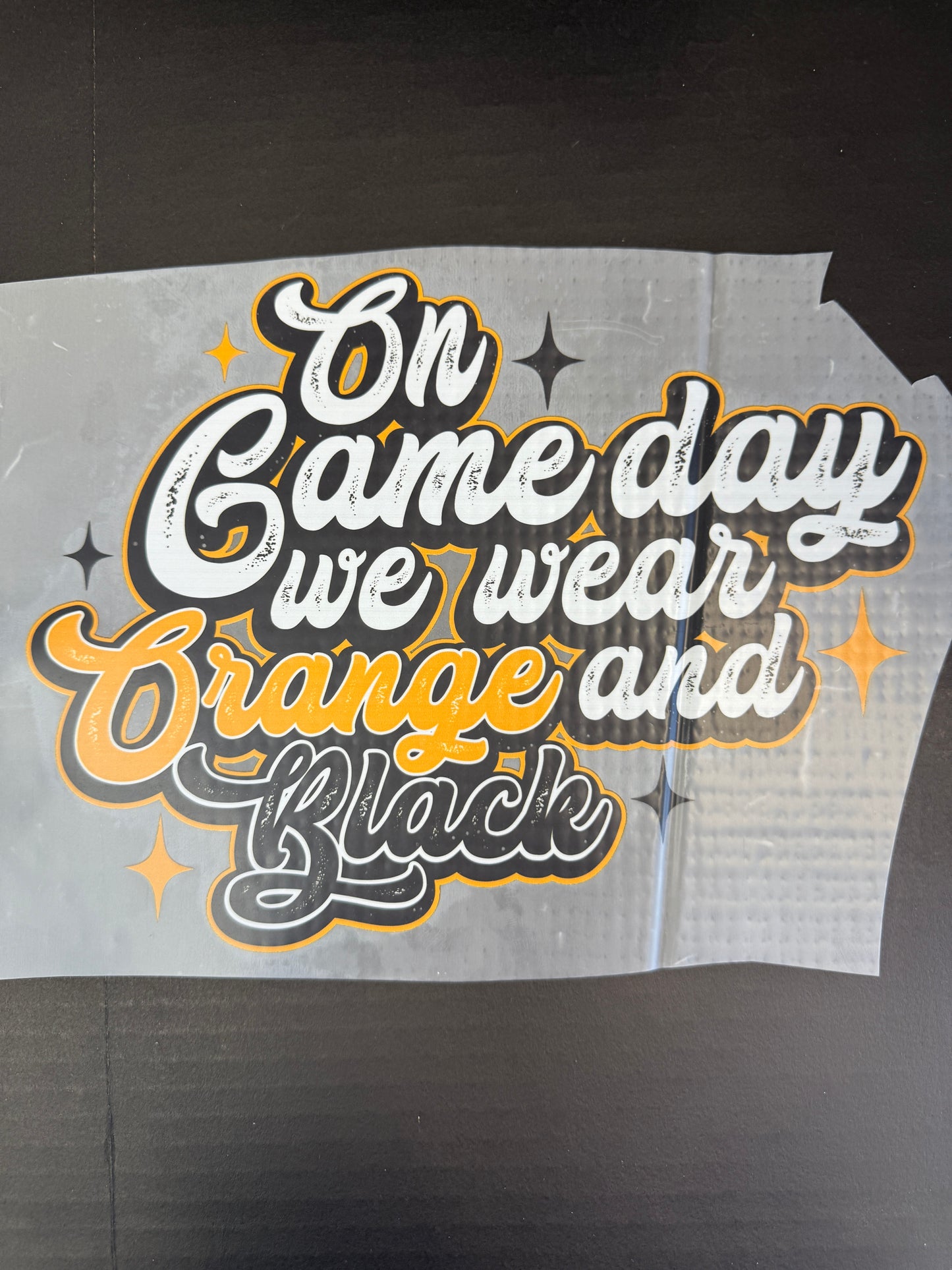on game day, we wear orange and black