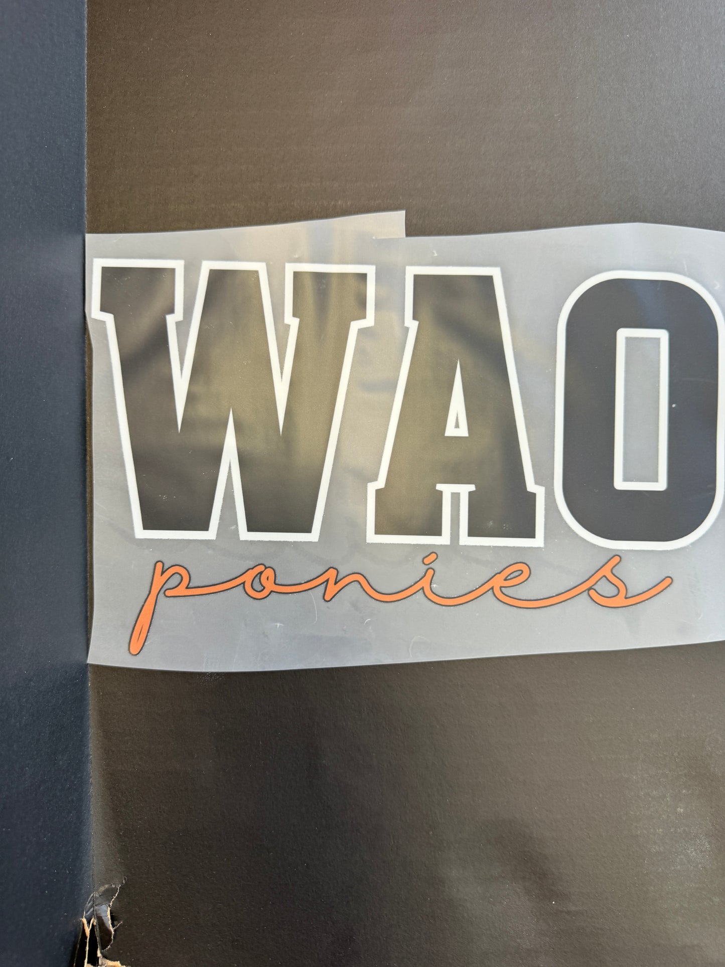 wao ponies black block orange script